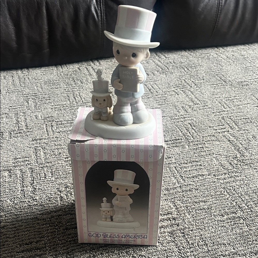 Precious Moments Figurine with Pink and White Accents